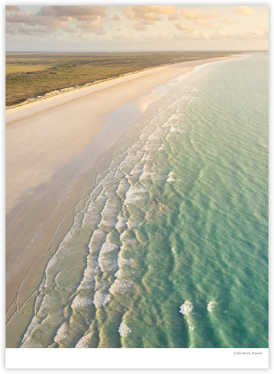 Broome & Beyond 2027 calendar photograph: Aerial view of white sand and waves at Cable Beach, Broome